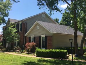 House with new roof and landscaping