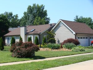 Suburban house with landscaped garden.