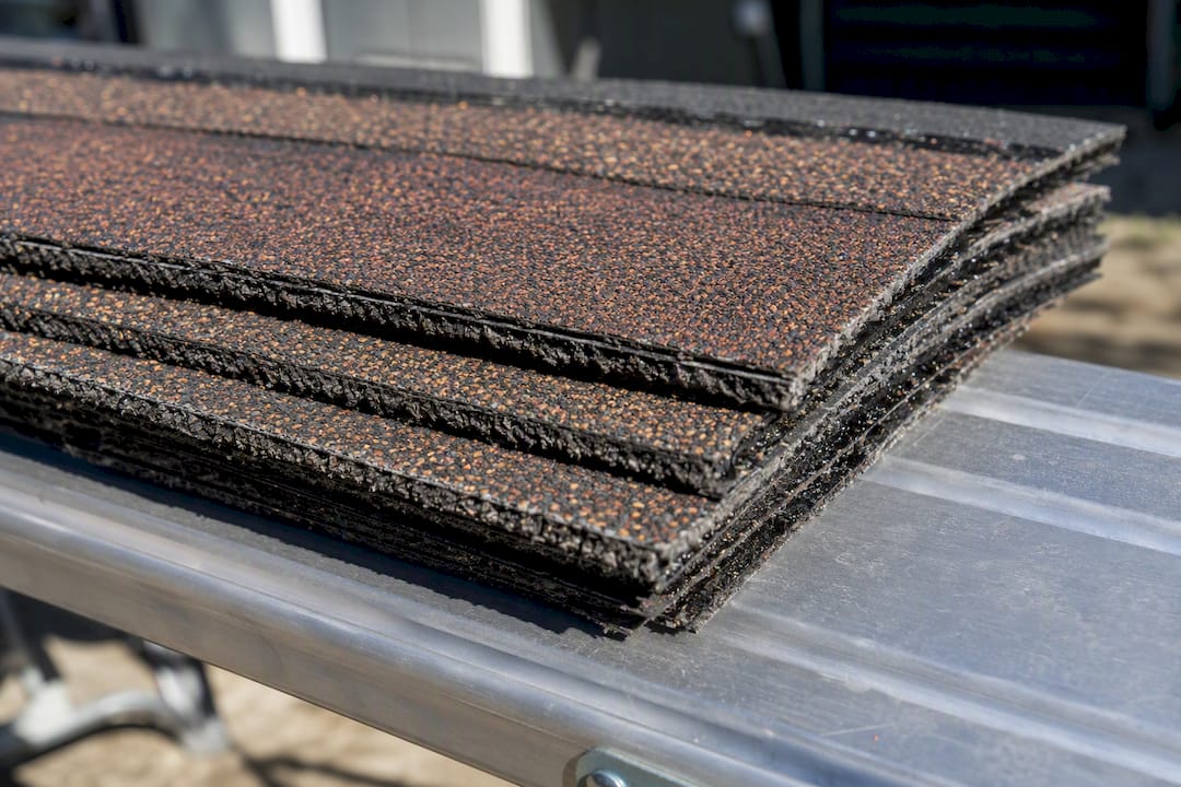 Close-up stack of premium Class 4 roofing shingles