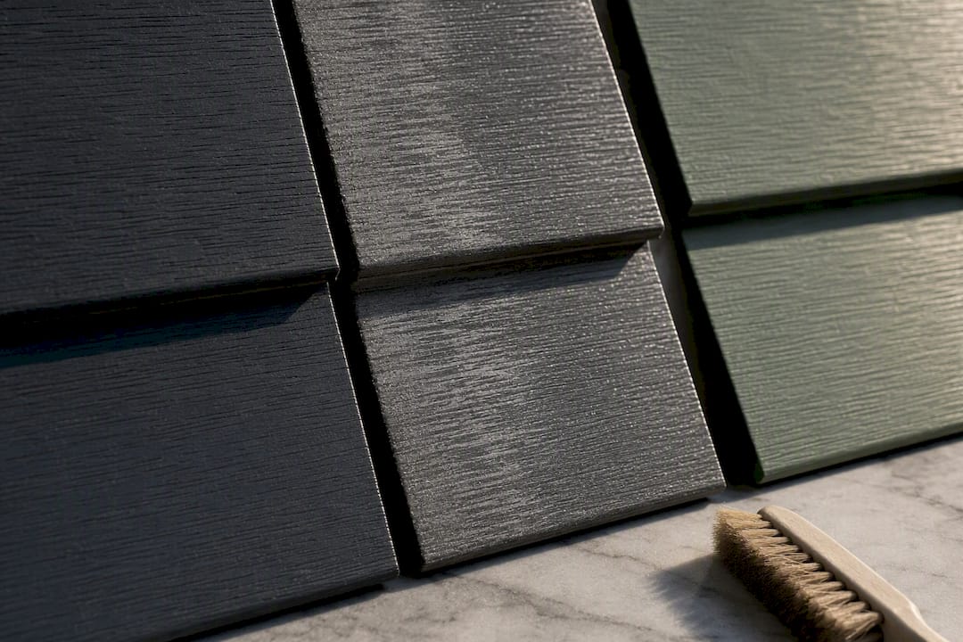 Siding surfaces showing color and chalking differences